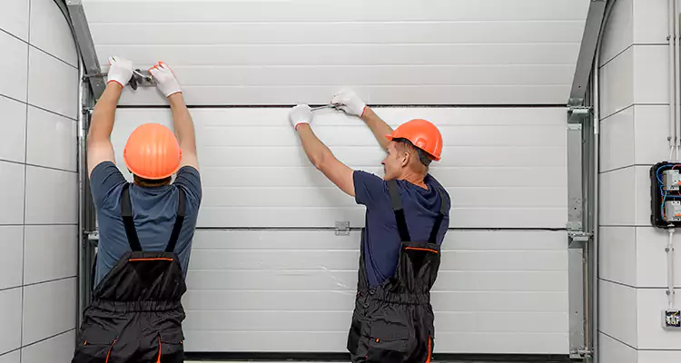 Garage Door Bottom Panel Repair in West Little River, FL